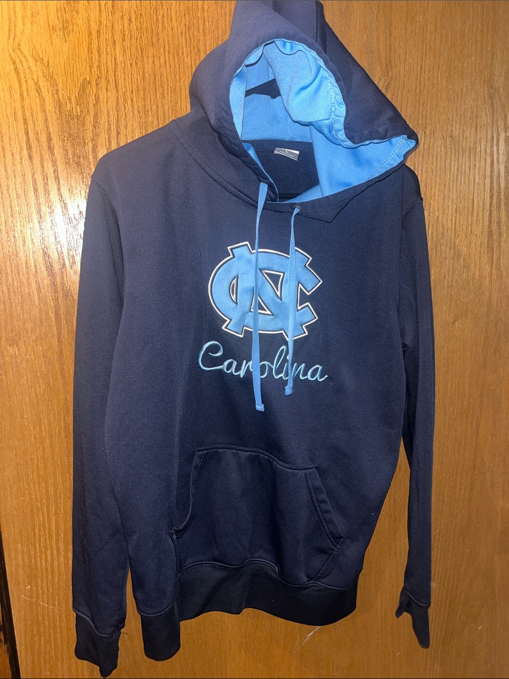 Stadium Athletics Navy and Carolina Blue hoodie see pic for seam needs fixed